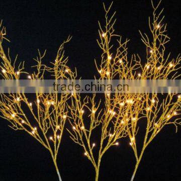 branch light with golden glitter