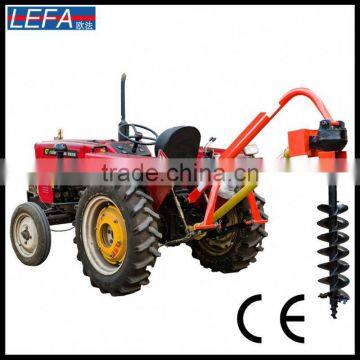 Tractor portable auger for earth drilling