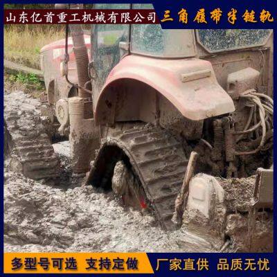 Installing a Triangular Semi Chain Track on a Four-wheel Drive Tractor for Paddy Field Operations to Reduce Compaction Rate photo-2