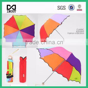 lady 3 folds inverse open bright colored umbrella