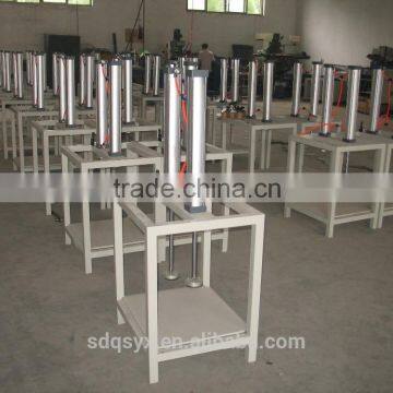 Pneumatic pressing machine for photo album making