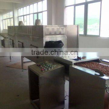 Tunnel microwave roasting machine for sesame seeds