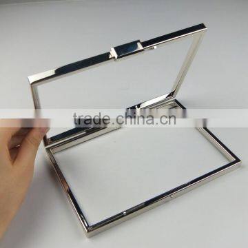 shiny square metal clutch frame with plastic box