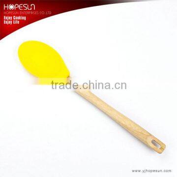 Popular food grade yellow silicone baking spoon with wooden handle