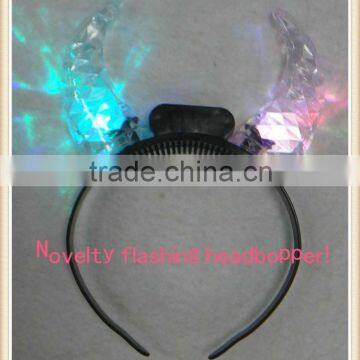 Novelty flashing crystal headbopper