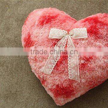 Heart-shaped plush cushion