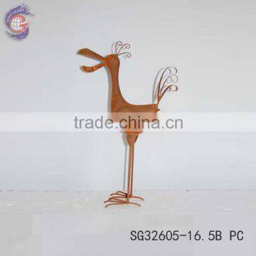 Rusty theme ornament of metal birds standing in garden for decorations