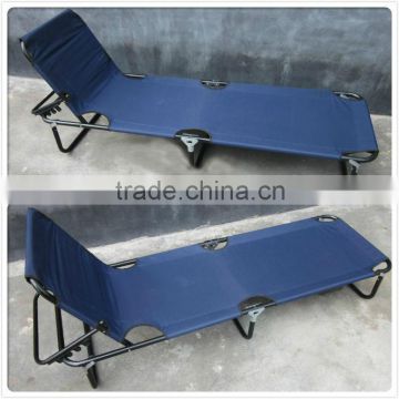 Outdoor steel adjustable folding bed with backrest and pillow.