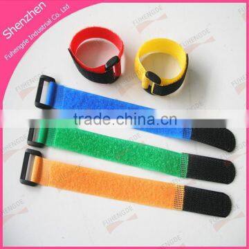 Colored hook loop strap with plastic buckle