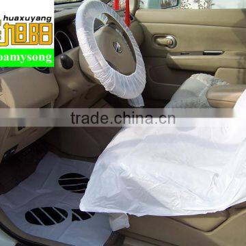 Wholesale LDPE White Color Printing VW Logo Waterproof and Two Pockets 500pcs per Roll Plastic Disposable Car Seat Cover