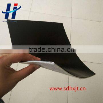 Geomembrane with nonwoven geotextile for dam liner