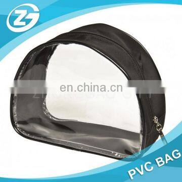 Promotional cosmetic bag round with black piping and zipper