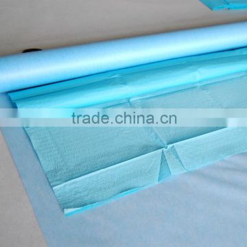 china bestseller spunlaced nonwoven fabric laminated with PE film for hospital