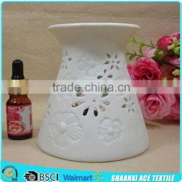 Flower logo carved ceramic aroma burner Porcelain fragrance burner for spa promotion                        
                                                Quality Choice