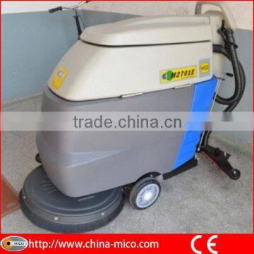 Hand held battery type walk behind floor scrubber
