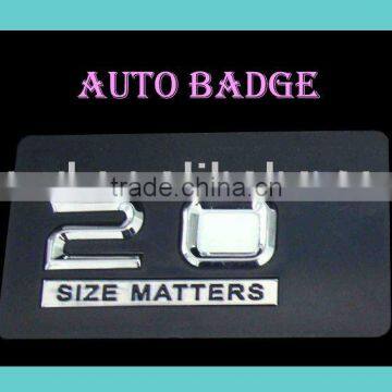 car emblem, auto badge, chrome sticker