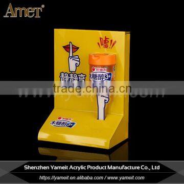 China gold supplier acrylic chewing gum display stand