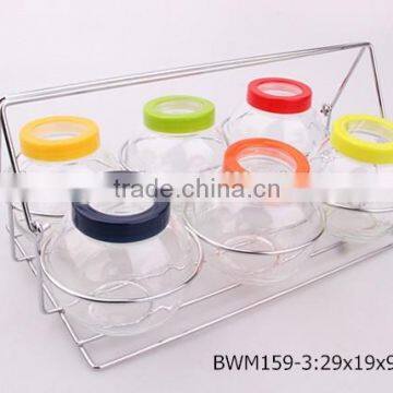 6pcs Round Glass Jar Set With Plastic Lid in a Silver Rack photo-1