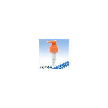 Orange plastic lotion pump for shampoo bottle