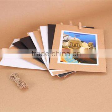 popular creative paper photo frames hanging over at the wall