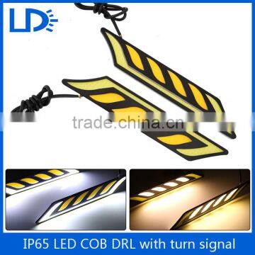 Factory Price 12v Cob Drl Led waterproof Day Running Lights with turn signal for Universal Cars