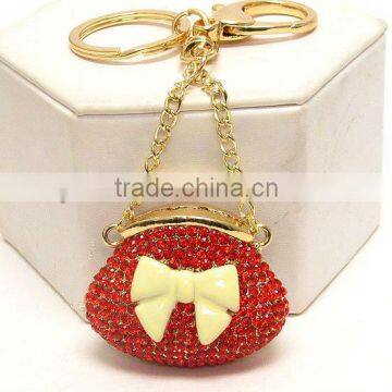 Crystal and epoxy bow with small chain hand bag key chain