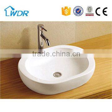 Chaozhou WDR oval counter top ceramic art basin for wholesale                        
                                                                                Supplier's Choice