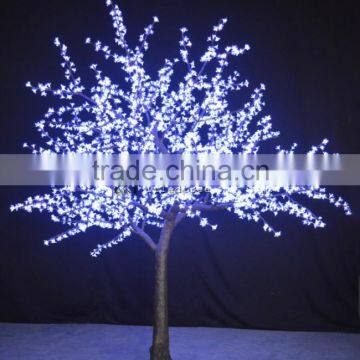 Holiday decoration lighted cherry blossom branches