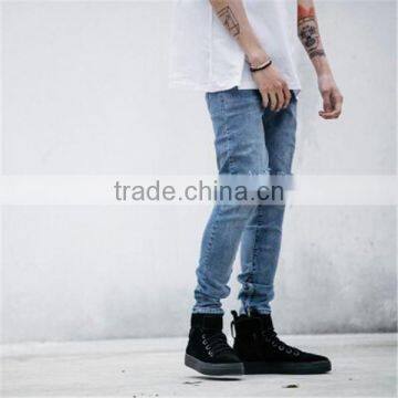 Slightly Faded Blue Jeans With Zip Down Whiskering Ripped Pants photo-5