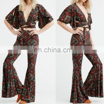 Two pieces clothing floral print suits ladies with cropped bandage tops and flare bottoms