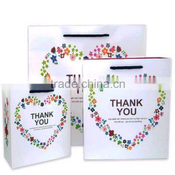 Elegant and nice variety of size white colour paper packing bag with handle