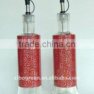 round glass oil bottle with metal casing (TW675T24)