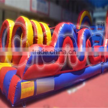 Factory price cheap inflatable obstacle course for sale, rainbow color jumping slide obstacle for children