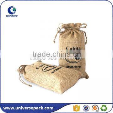 Natural material jute drawstring bag with black printing                        
                                                                                Supplier's Choice