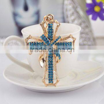 Unique cross shape floating metal keychain hot sale in new zealand