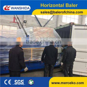 Hydraulic Driven Type Semi-automatic Grade PET Bottle Scrap Plastic Baler Machine photo-4