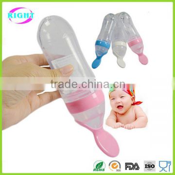 Silicone baby feeding bottle with spoon