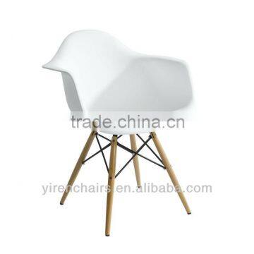 white tulip plastic chair with wooden legs