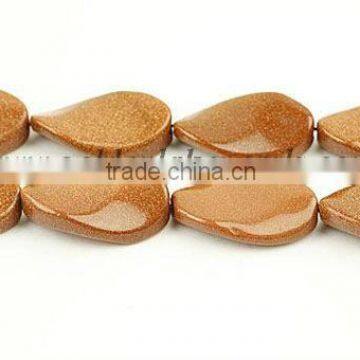 Goldstone Twist Oval Beads