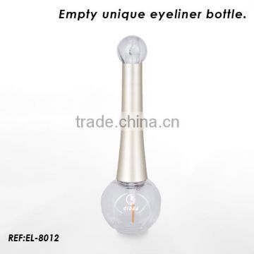 Empty clear eyeliner bottle with gold cap