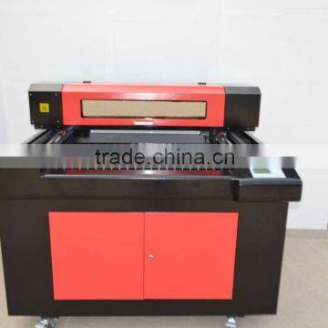 Stainless steel laser engraving machine LME6540 with metal tube engraved dark