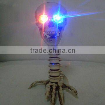 The scary halloween skull decoration with flash LED light