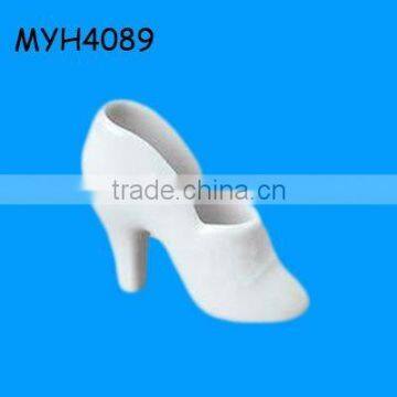 designed unpainted high heel bisque shoe figurine