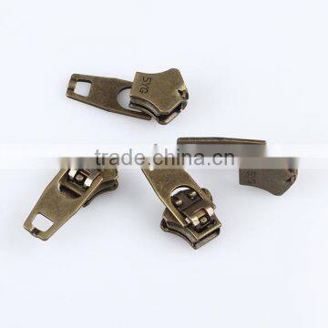 Antique brass color #4.5YG slider and spring lock slider