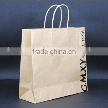 white / brown kraft paper bag with twisted rope