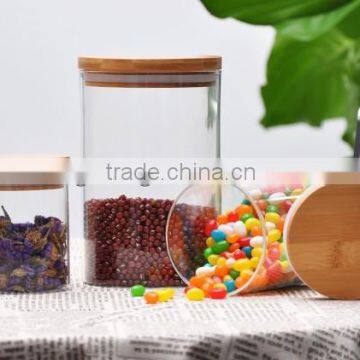 Glass storage container with wood lid