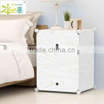 Adjustable plastic bedside table
