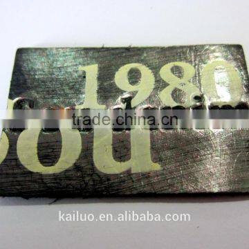 Embossed logo leather label for jeans