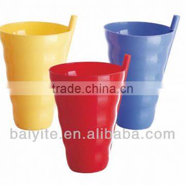 colored plastic drinking cup with straw