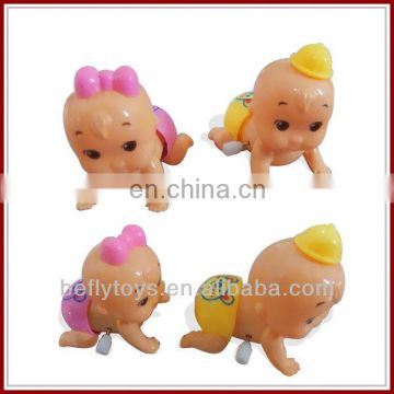 Climbing toy wind up baby doll